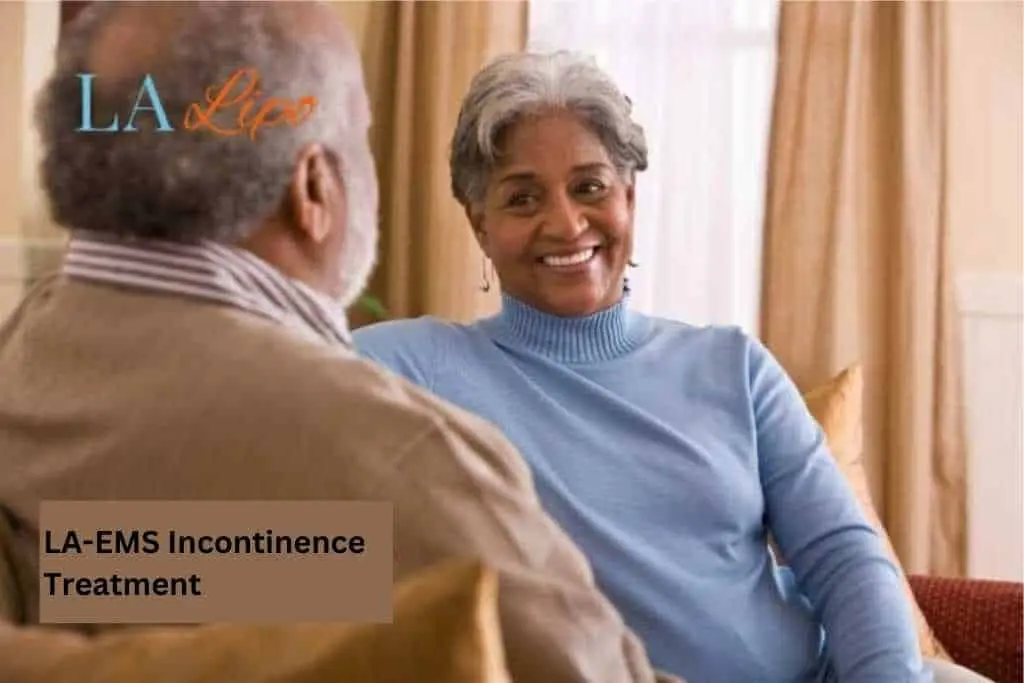 Couple sat smiling at each other - LA-EMS treatment Hampton Wick