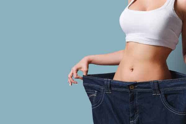 woman after fat reduction treatment Hampton Wick