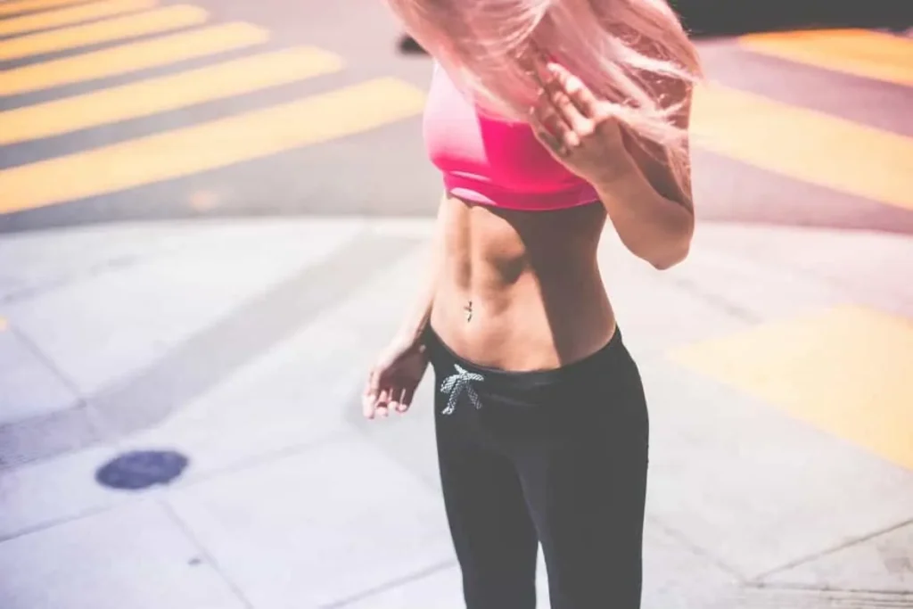 Woman with toned stomach after LA-EMS Body Sculpting Treatment Hampton Wick